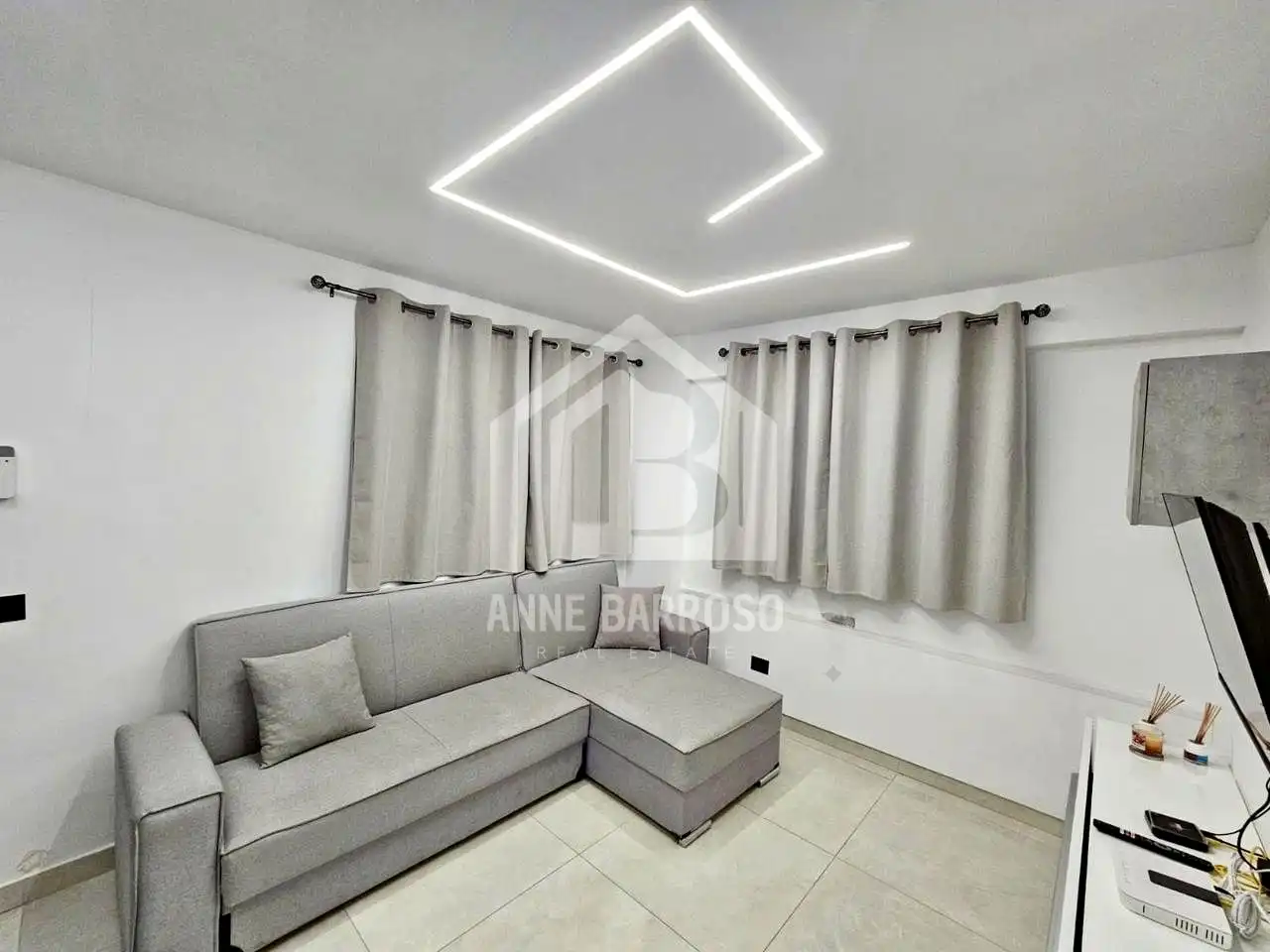 Sala d'estar de Pis de lloguer en Arona amb Aire condicionat i Moblat