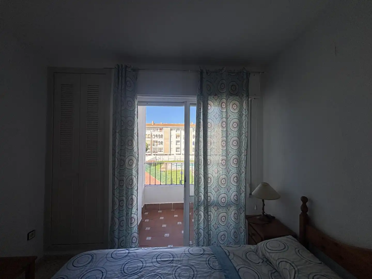 Habitación de Piso de alquiler en El Portil con Jardín privado, Terraza y Piscina