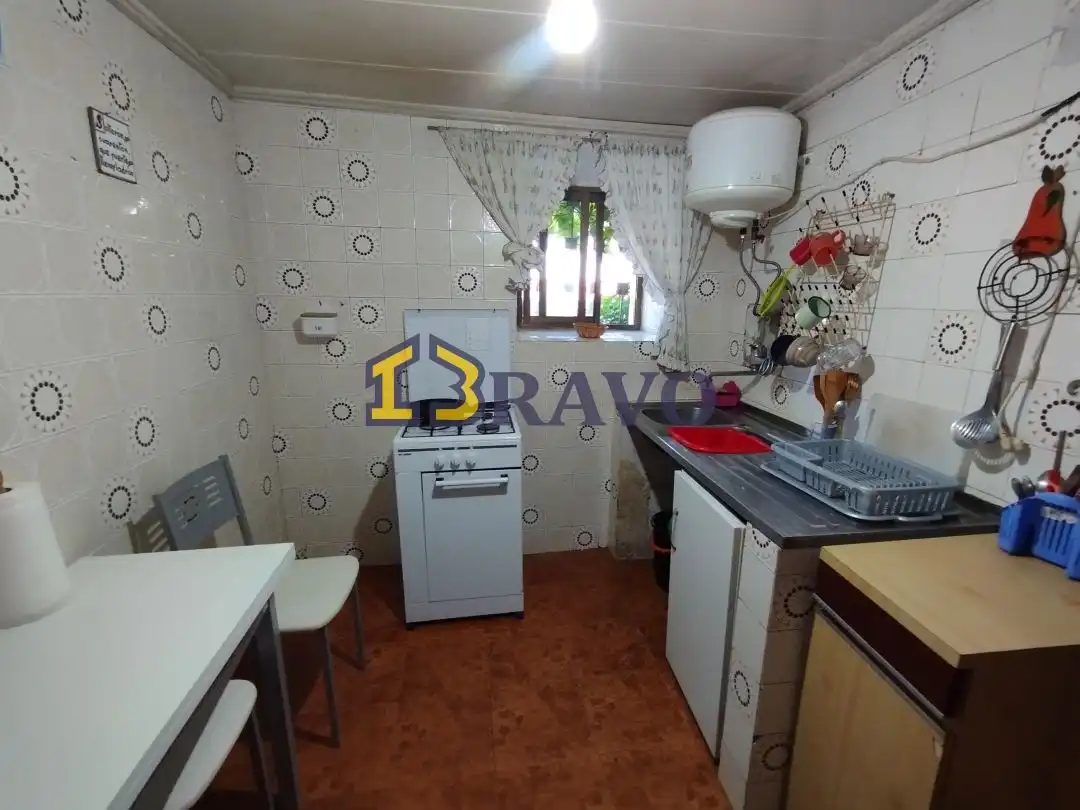Cocina de Casa adosada en venta en Junta de Traslaloma con Calefacción, Jardín privado y Amueblado