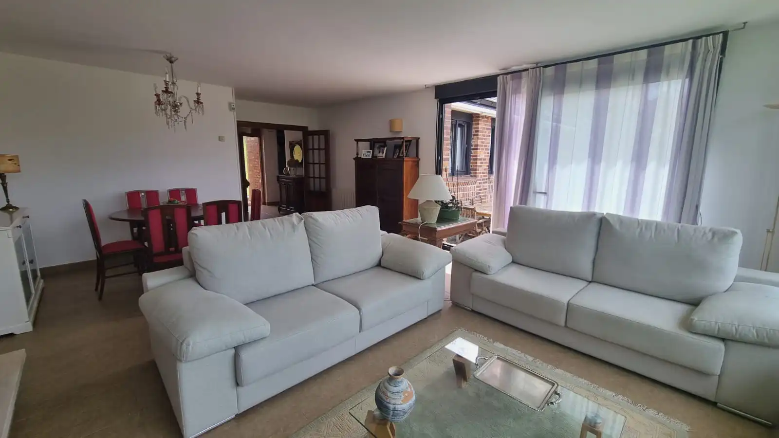 Sala d'estar de Casa o xalet en venda en Miengo amb Calefacció, Jardí privat i Moblat