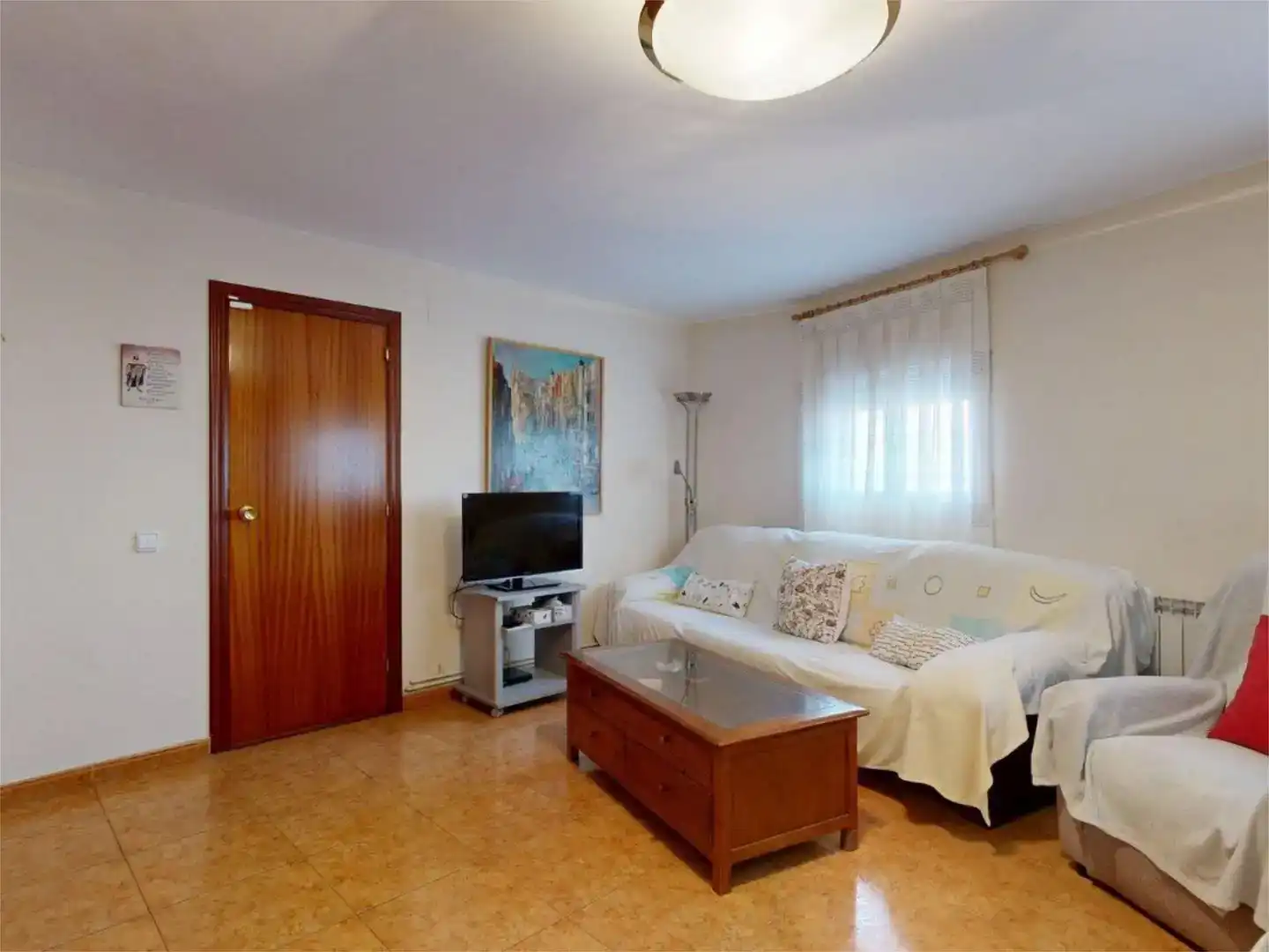 Sala d'estar de Casa adosada en venda en Cadrete