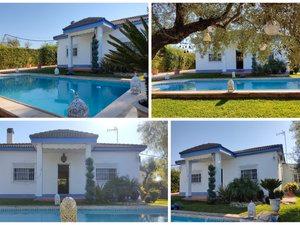 Exterior view of House or chalet for sale in Palomares del Río  with Air Conditioner, Heating and Private garden