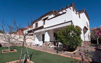 Exterior view of Single-family semi-detached for sale in Guillena  with Air Conditioner, Heating and Private garden