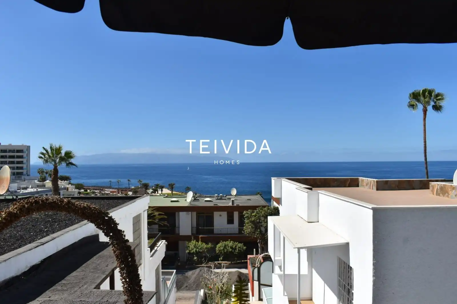 Vista exterior de Casa adosada de lloguer en Santiago del Teide amb Piscina i Moblat