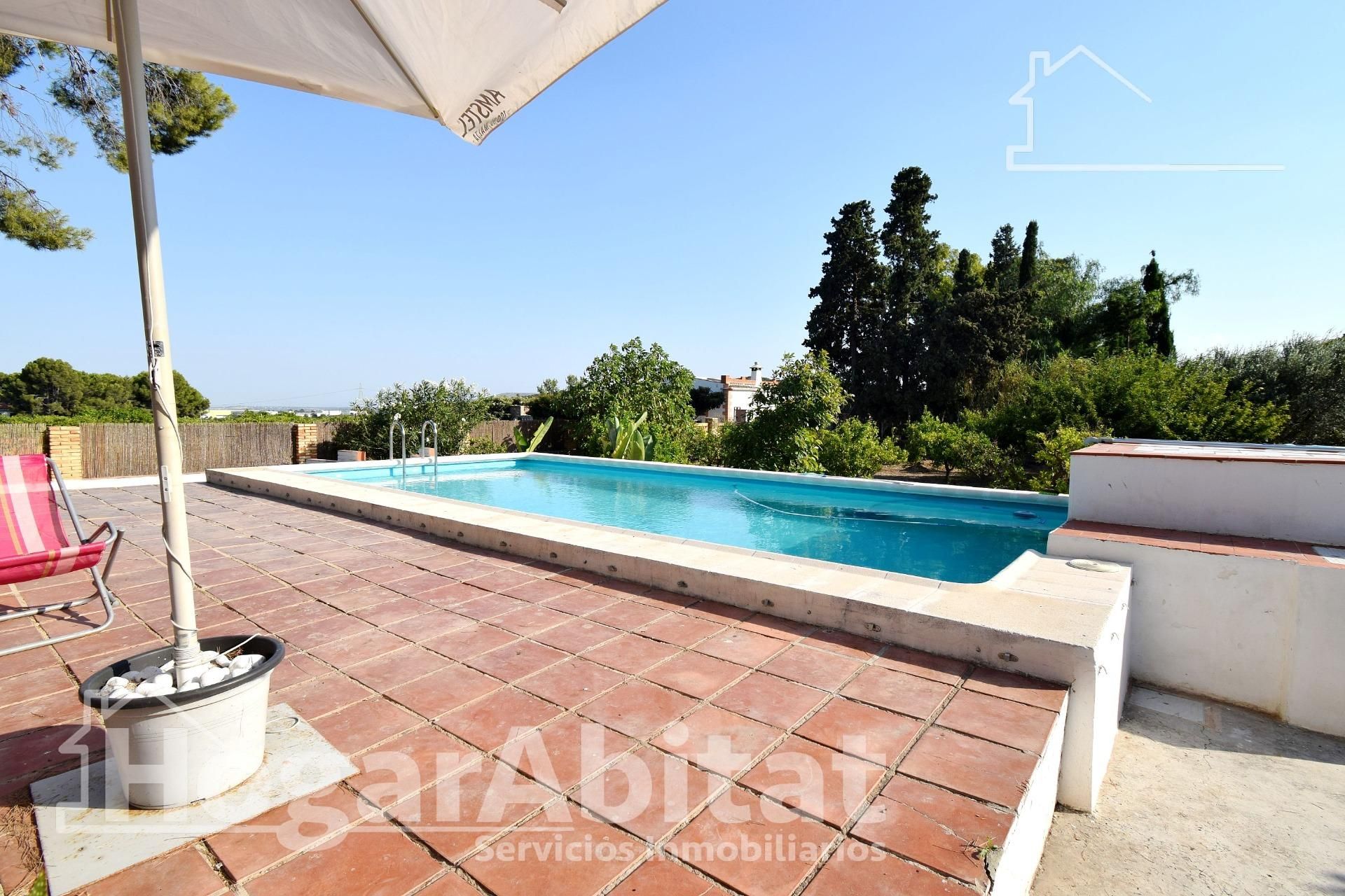 Piscina de Casa o xalet en venda en Cheste amb Jardí privat, Terrassa i Traster