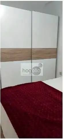 Dormitori de Pis de lloguer en Sevilla amb Aire condicionat, Terrassa i Moblat