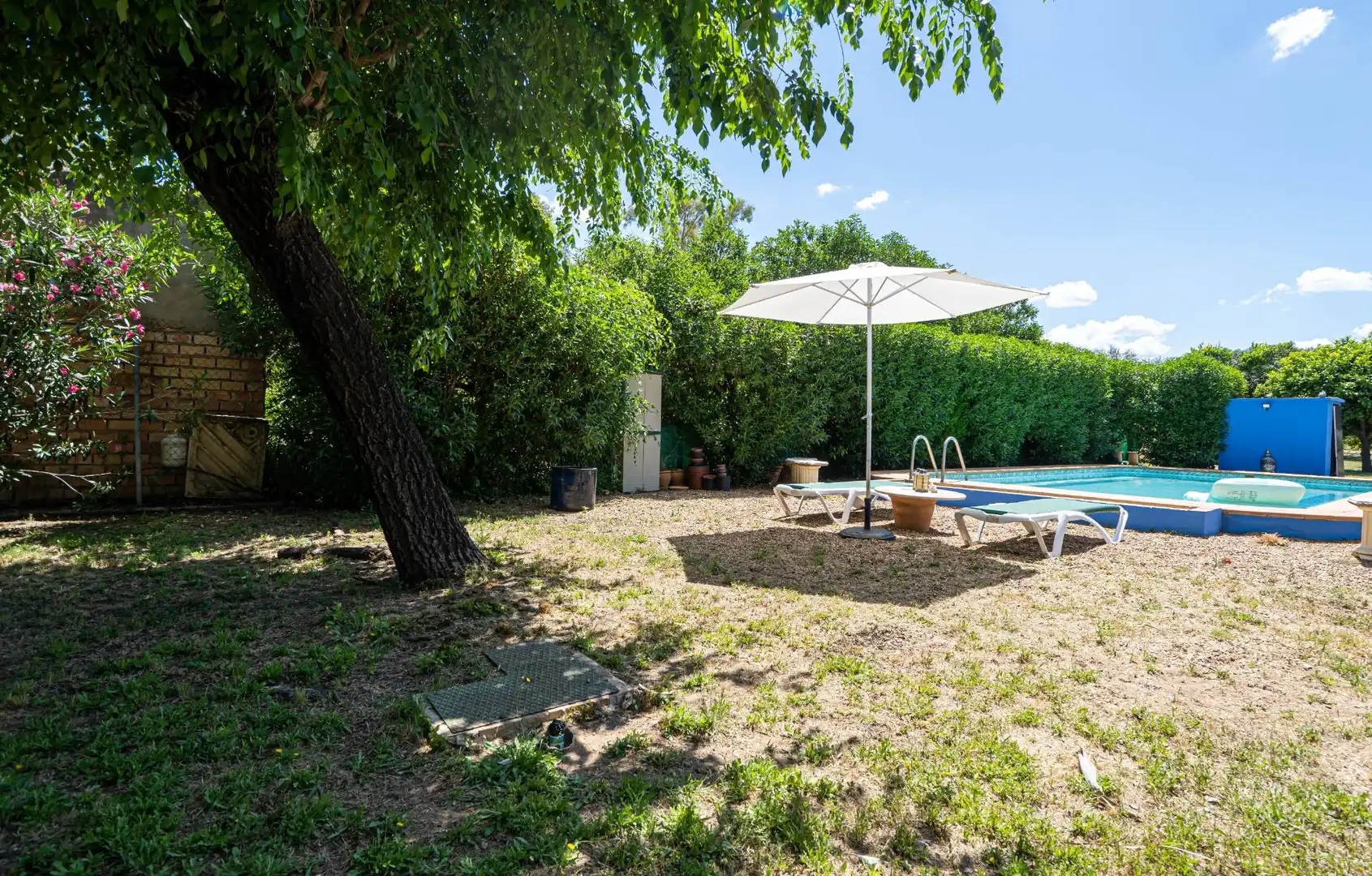 Swimming pool of Houses for sale in Marchena  with Air Conditioner, Heating and Private garden