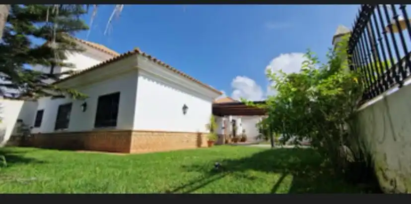 Außenansicht von Haus oder Chalet zum Verkauf in El Portil mit Privatgarten, Terrasse und Schwimmbad