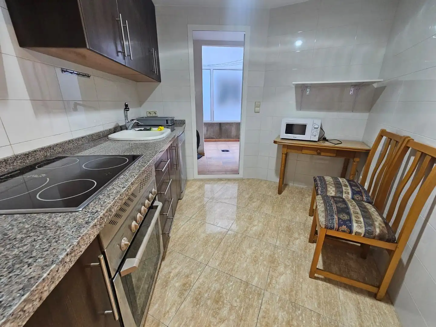 Kitchen of Flat for sale in Simat de la Valldigna  with Air Conditioner, Private garden and Balcony