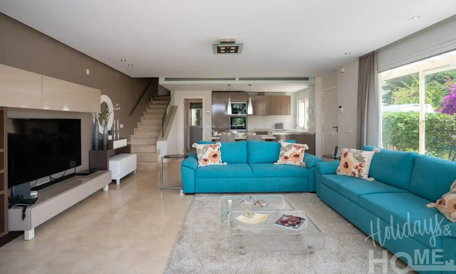 Sala d'estar de Pis de lloguer en Marbella amb Aire condicionat, Jardí privat i Terrassa