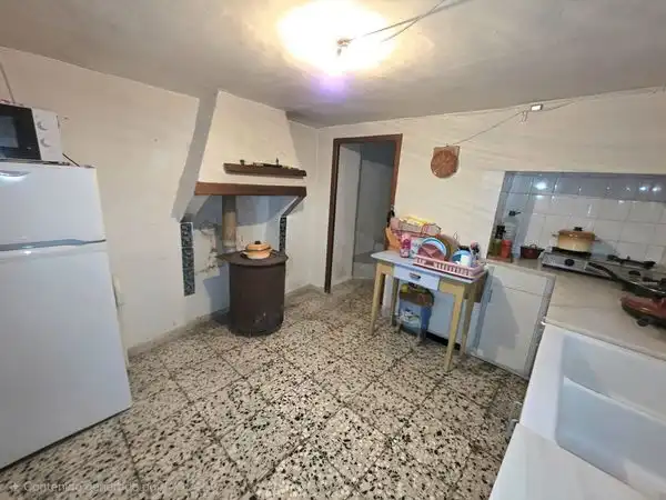 Cuina de Casa adosada en venda en María amb Jardí privat, Traster i Moblat