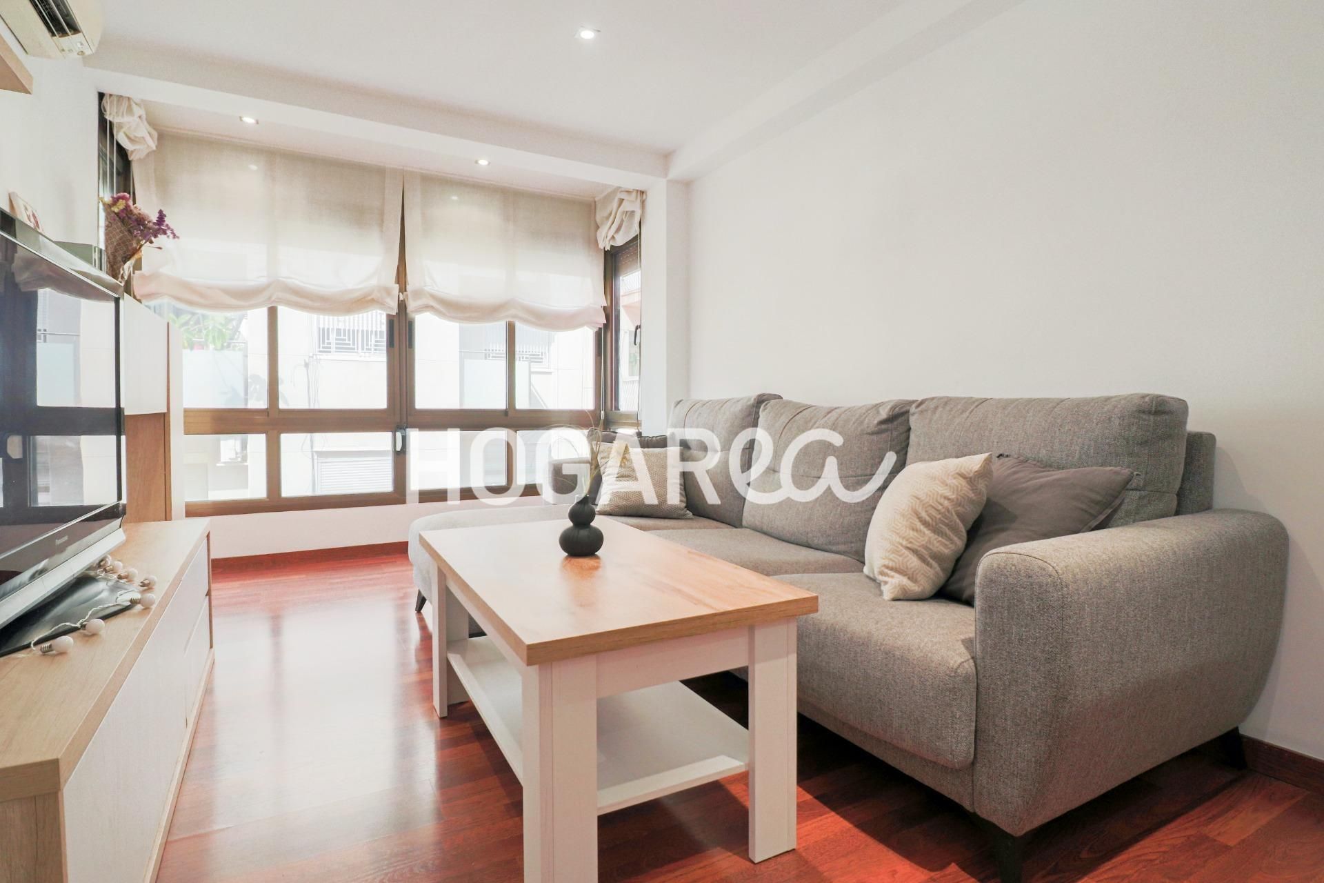 Living room of Flat for sale in Sant Boi de Llobregat  with Air Conditioner, Parquet flooring and Balcony