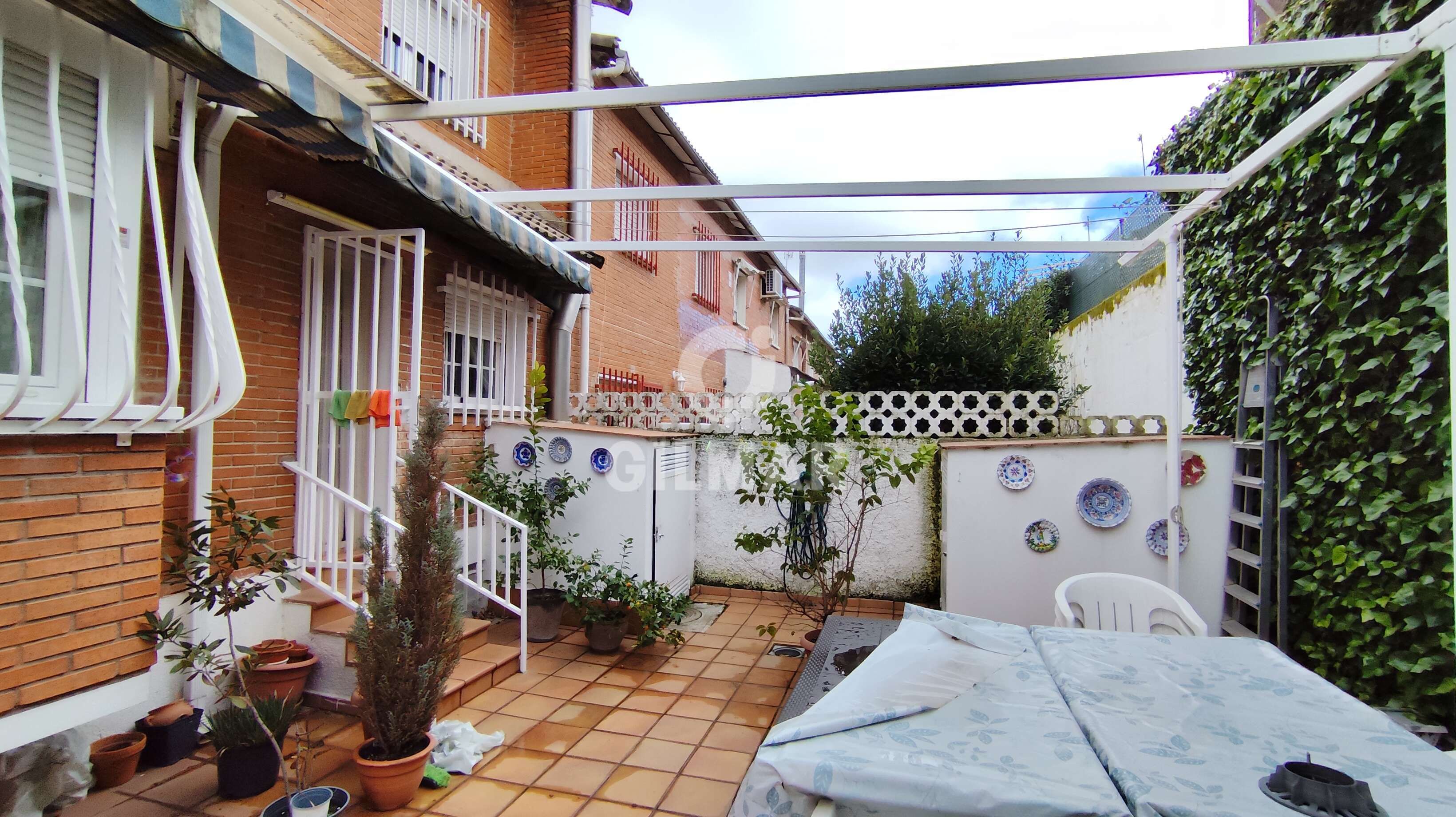 Terrassa de Casa adosada en venda en Pozuelo de Alarcón amb Calefacció, Jardí privat i Piscina