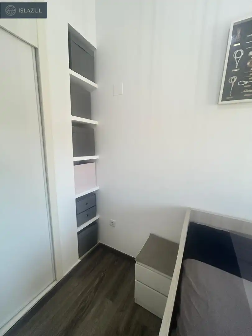 Dormitori de Apartament en venda en Isla Cristina amb Aire condicionat, Jardí privat i Terrassa