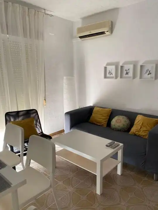 Living room of Flat for rent in Granada  with Air Conditioner, Heating and Furnished