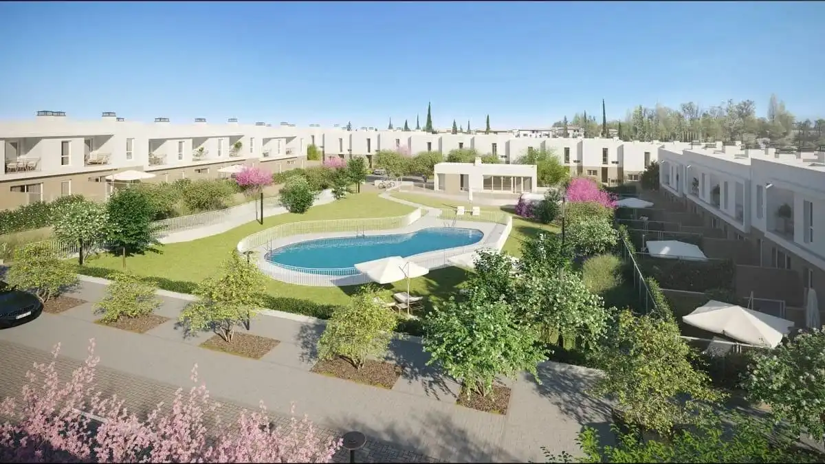 Vista exterior de Casa adosada en venda en Guillena amb Jardí privat, Terrassa i Piscina comunitària