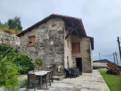 Vista exterior de Casa o xalet en venda en Bueu amb Balcó