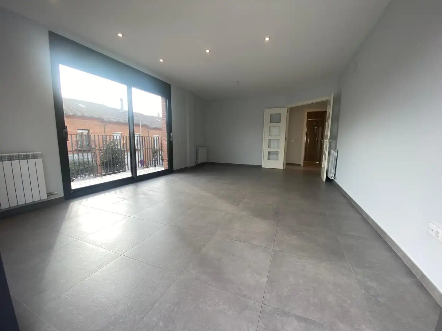 Sala de estar de Casa adosada en venta en Vic con Calefacción, Jardín privado y Terraza