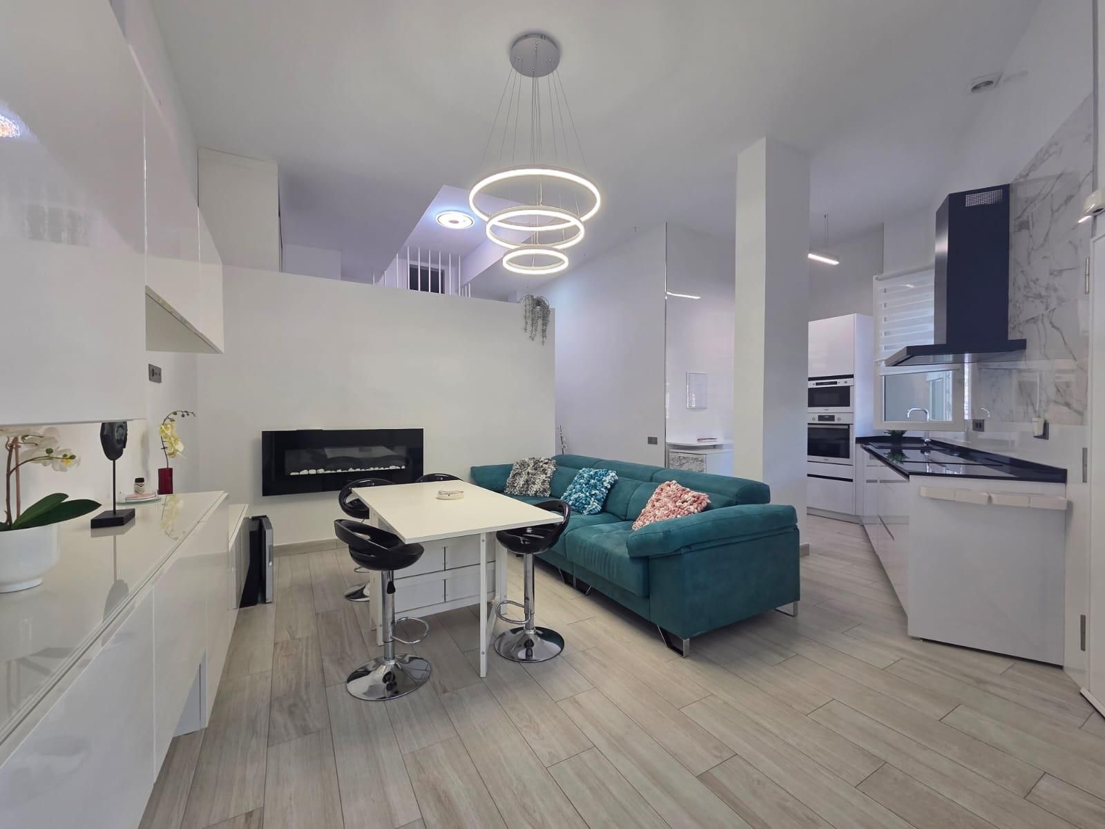 Living room of Flat for sale in Benalmádena  with Air Conditioner, Private garden and Community pool