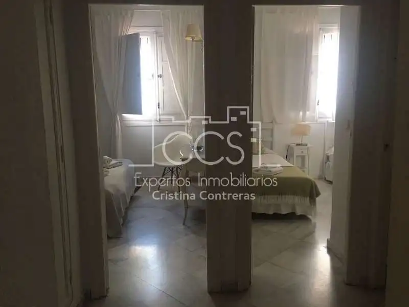 Dormitori de Casa adosada en venda en Sevilla amb Aire condicionat