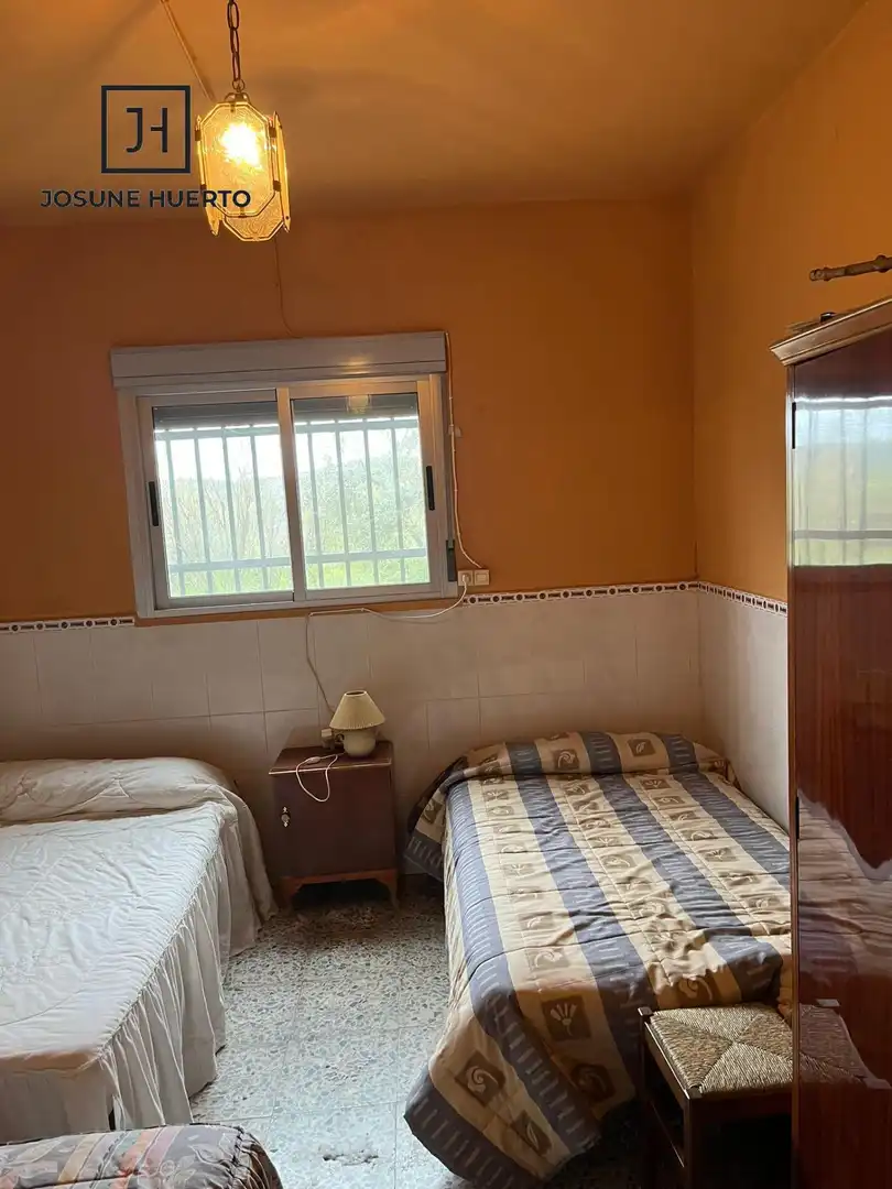 Habitación de Finca rústica en venta en Quintana de la Serena con Calefacción y Jardín privado