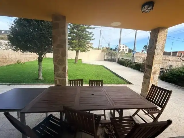 Terrassa de Casa o xalet en venda en Sanxenxo amb Jardí privat, Terrassa i Moblat