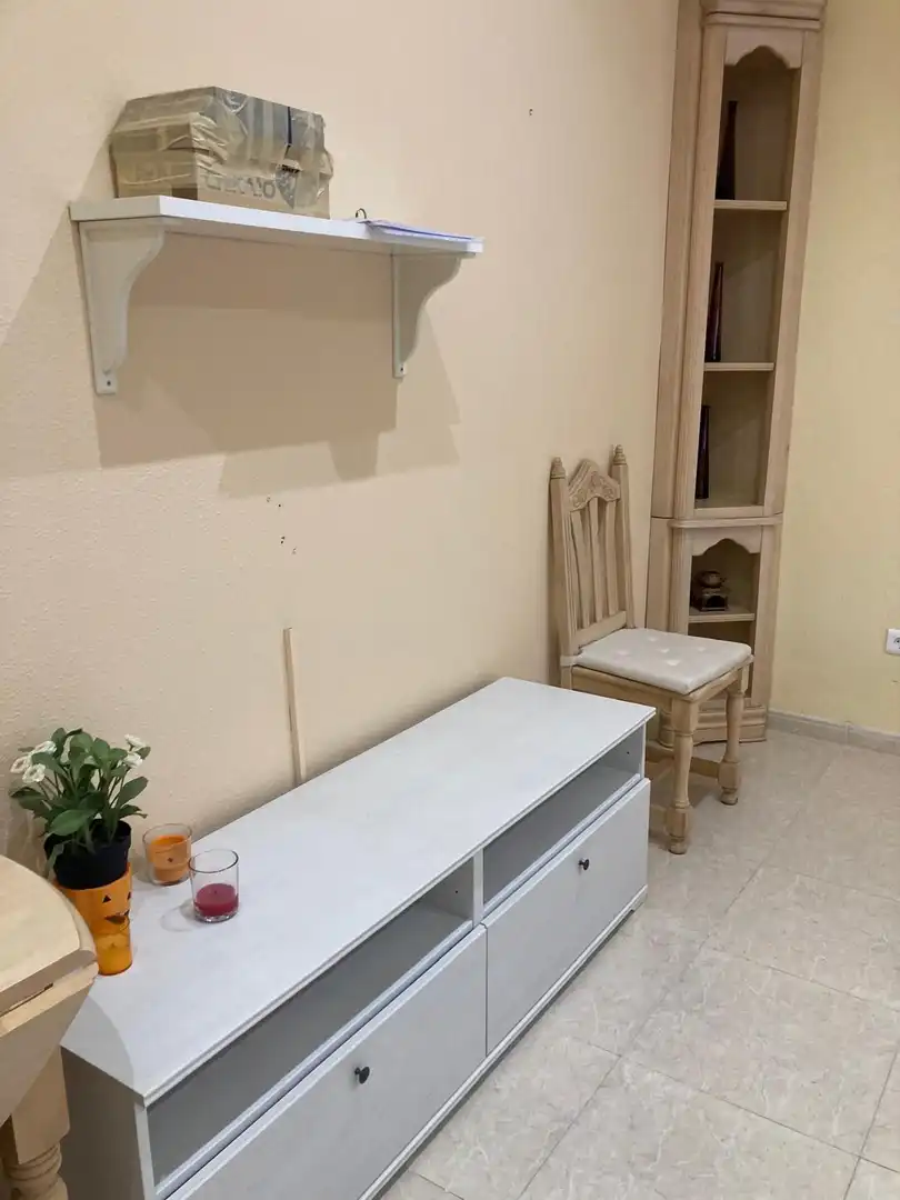 Sala de estar de Estudio de alquiler en Benalmádena con Piscina comunitaria