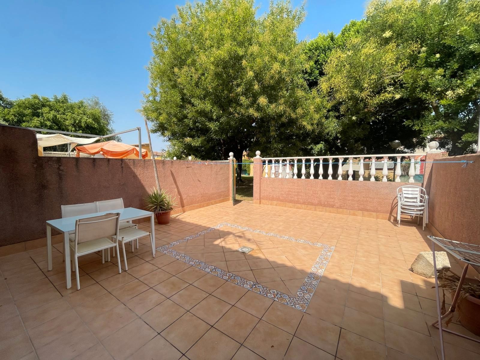 Jardí de Casa adosada en venda en Villanueva del Ariscal amb Aire condicionat i Piscina comunitària
