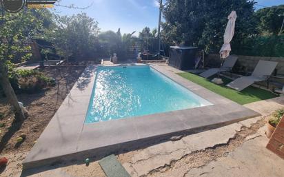 Swimming pool of House or chalet for sale in Olocau  with Air Conditioner, Terrace and Swimming Pool