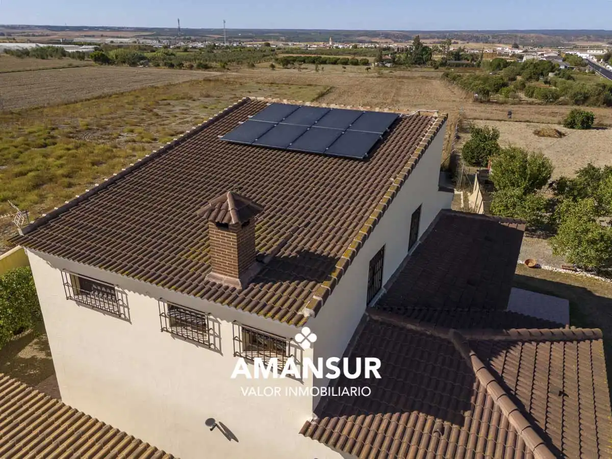 Vista exterior de Casa o xalet en venda en Villarrasa amb Aire condicionat, Calefacció i Jardí privat