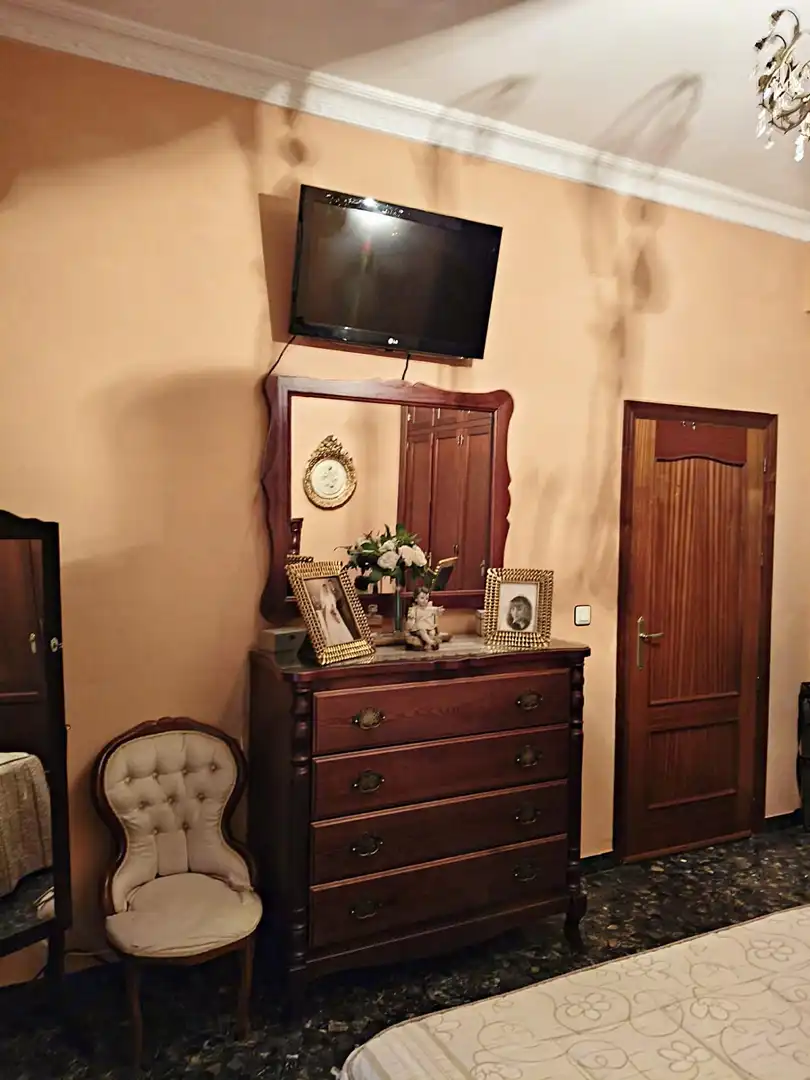 Habitación de Casa adosada en venta en Pilas con Aire acondicionado y Terraza