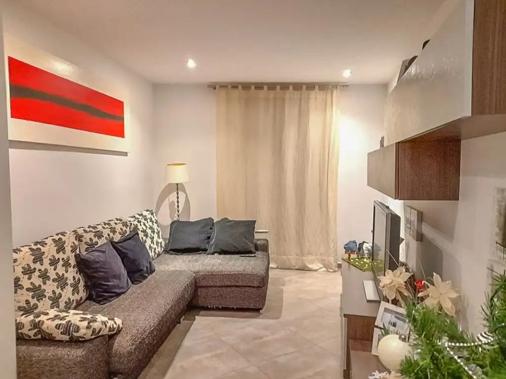 Sala d'estar de Casa adosada en venda en Pollença