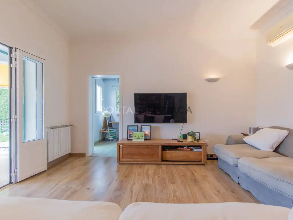 Sala d'estar de Casa o xalet en venda en Alaior amb Aire condicionat, Jardí privat i Piscina