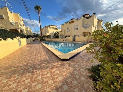 Vista exterior de Casa o xalet en venda en San Fulgencio amb Calefacció, Terrassa i Piscina