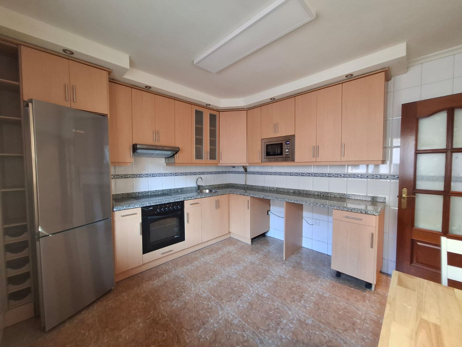 Kitchen of Duplex for sale in Gijón   with Heating and Storage room