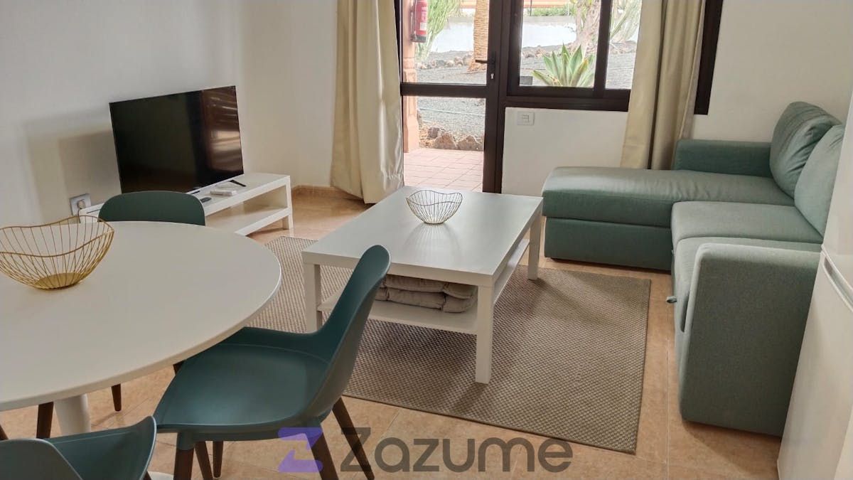 Sala d'estar de Pis de lloguer en La Oliva amb Aire condicionat, Calefacció i Jardí privat