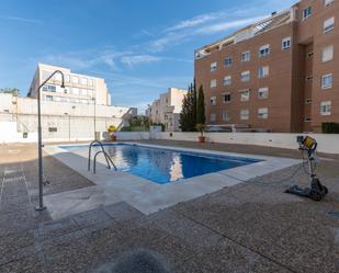 Swimming pool of Flat for sale in  Granada Capital  with Heating, Parquet flooring and Terrace