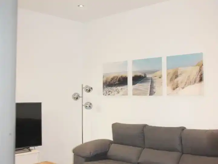 Sala d'estar de Casa adosada en venda en Vilassar de Mar amb Aire condicionat, Traster i Moblat