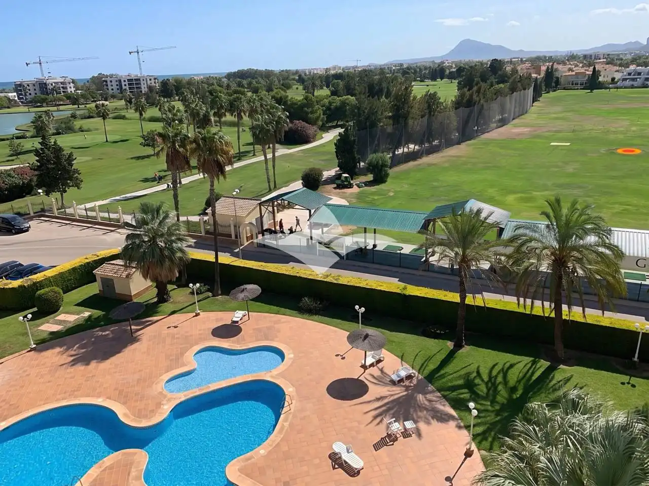 Swimming pool of Attic for sale in Oliva  with Air Conditioner, Parquet flooring and Terrace
