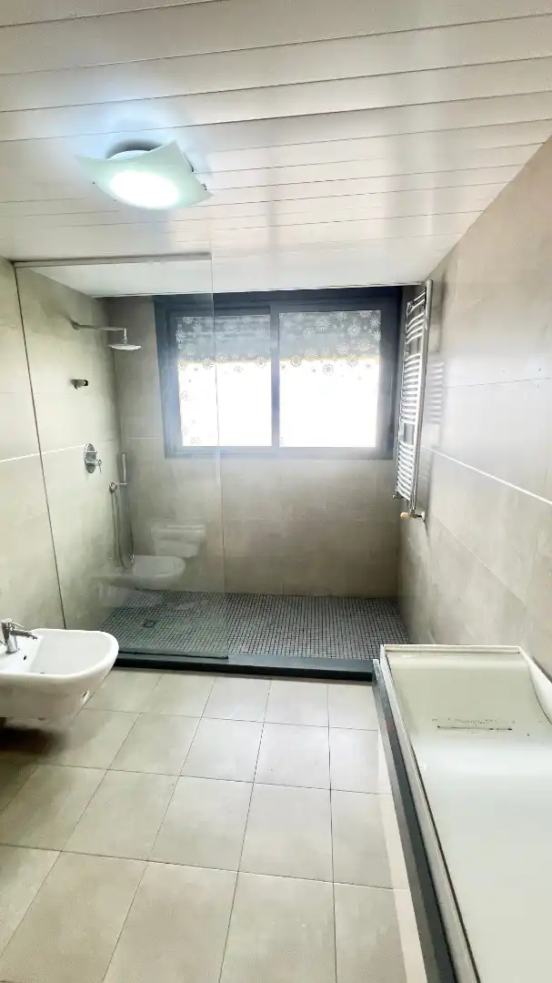 Bany de Casa adosada en venda en La Pobla de Farnals amb Aire condicionat, Calefacció i Jardí privat