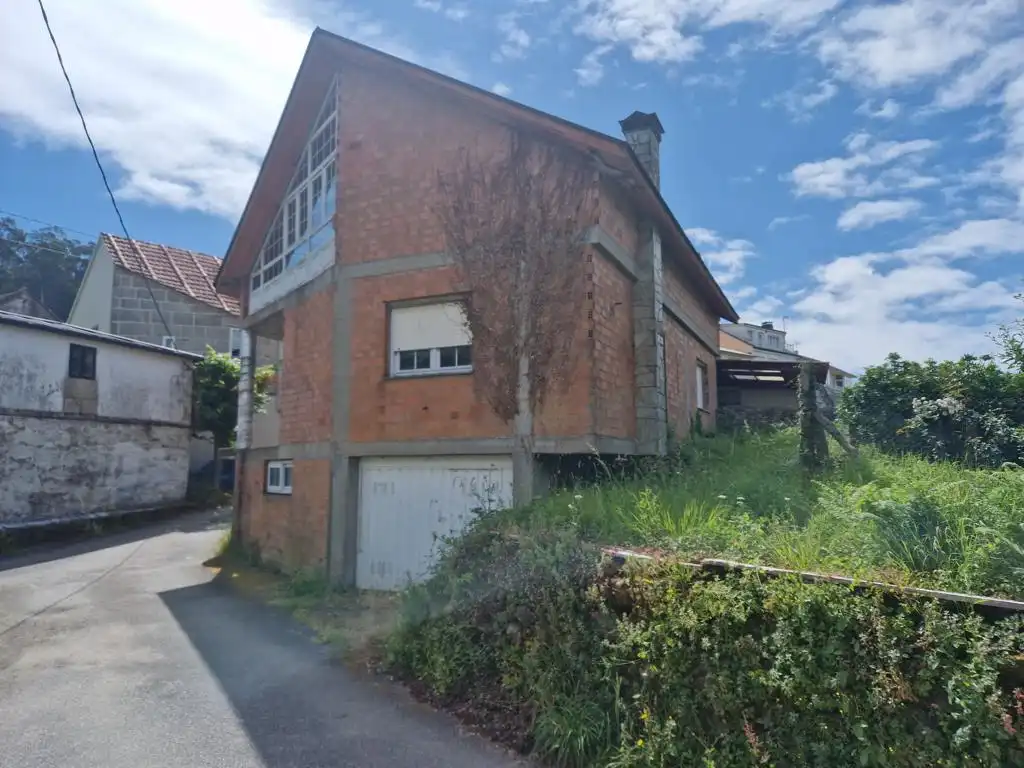 Vista exterior de Casa o xalet en venda en Rianxo amb Jardí privat, Traster i Balcó