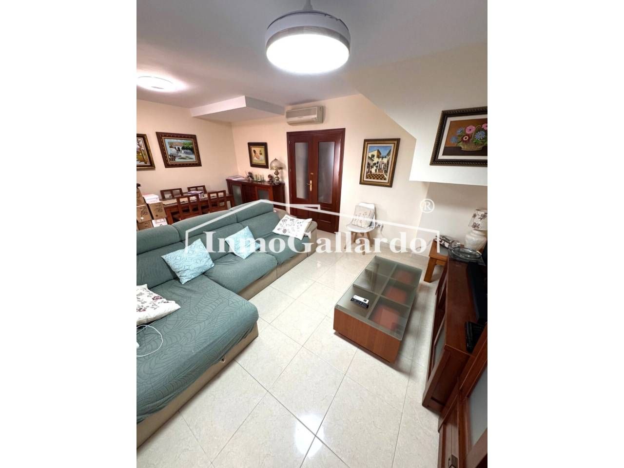 Sala d'estar de Casa adosada en venda en Rincón de la Victoria amb Aire condicionat i Piscina comunitària