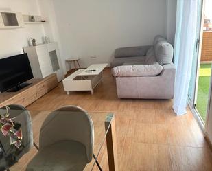 Sala d'estar de Pis de lloguer en  Almería Capital amb Aire condicionat, Jardí privat i Terrassa