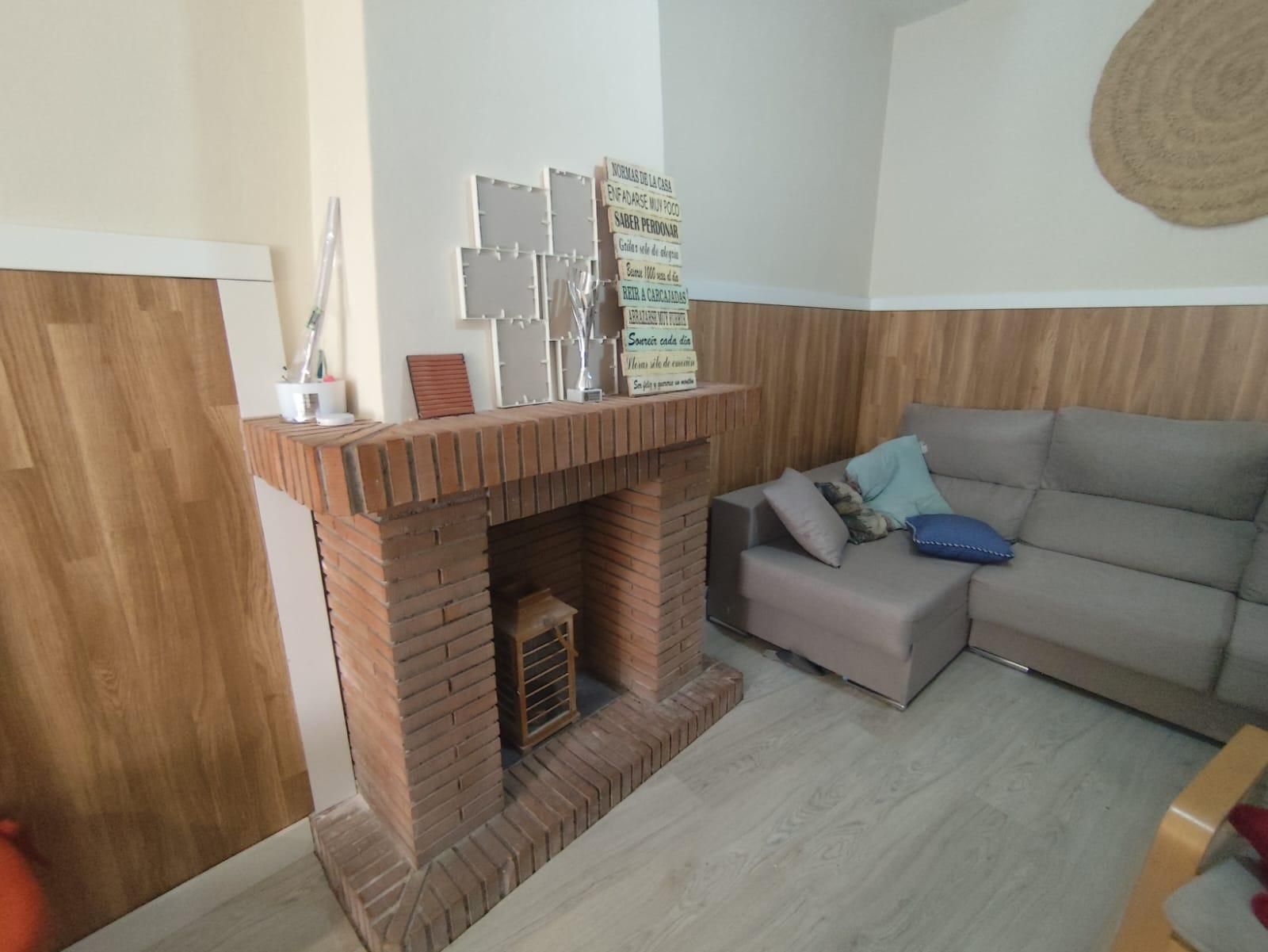 Sala de estar de Casa adosada en venta en Pioz con Aire acondicionado y Calefacción