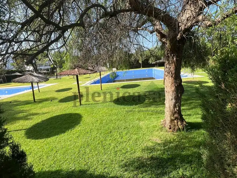 Piscina de Casa adosada en venta en Punta Umbría con Aire acondicionado, Calefacción y Jardín privado