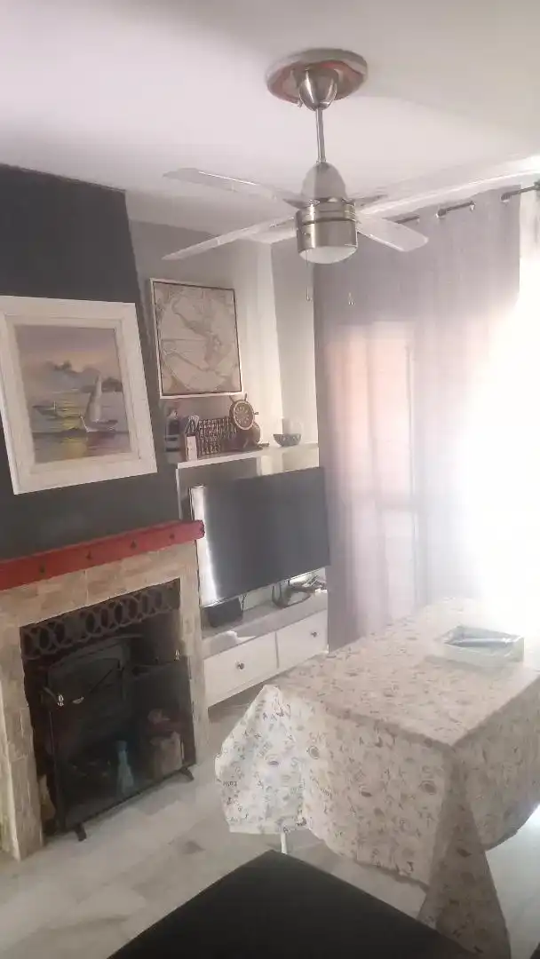 Sala d'estar de Casa o xalet de lloguer en Islantilla amb Aire condicionat i Balcó
