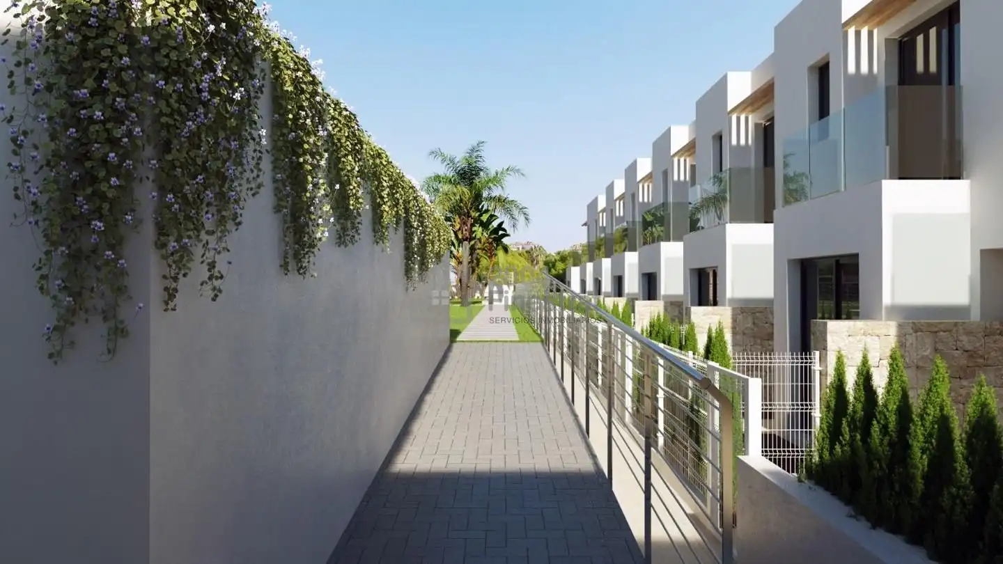 Vista exterior de Casa adosada en venda en Finestrat amb Jardí privat, Terrassa i Piscina comunitària
