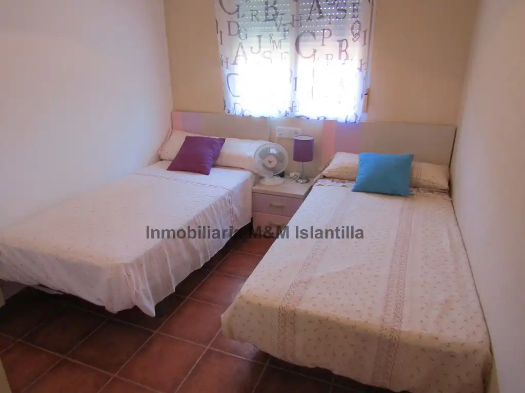 Habitación de Casa adosada en venta en Islantilla con Jardín privado, Terraza y Amueblado