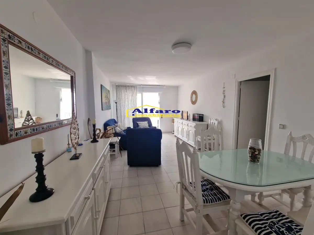 Sala de estar de Piso en venta en Almonte con Terraza, Balcón y Piscina comunitaria