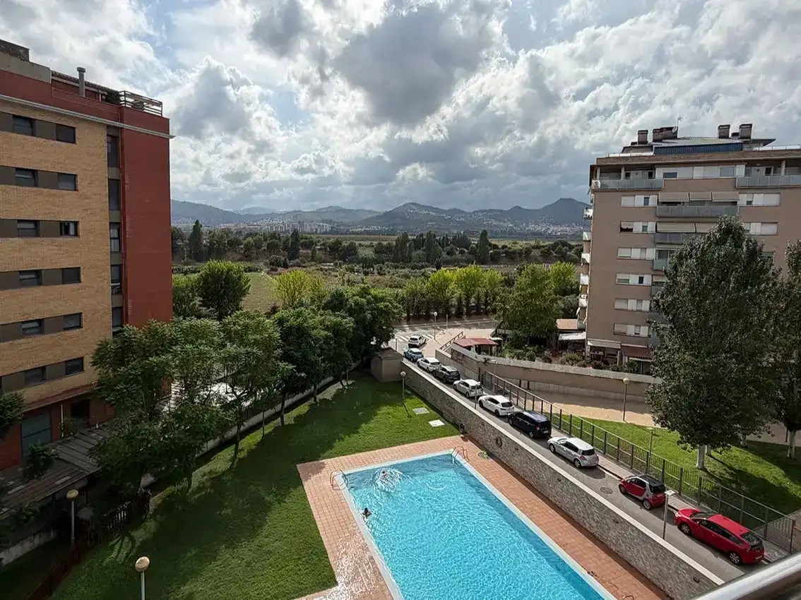 Exterior view of Attic for sale in Sant Joan Despí  with Air Conditioner, Swimming Pool and Balcony